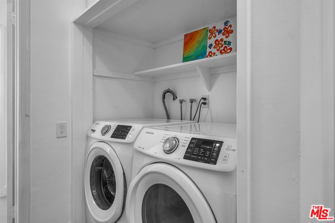 121 North Doheny Drive Beverly Hills, CA 90211 - Photo 12 of 20 a close up view of washer and dryer