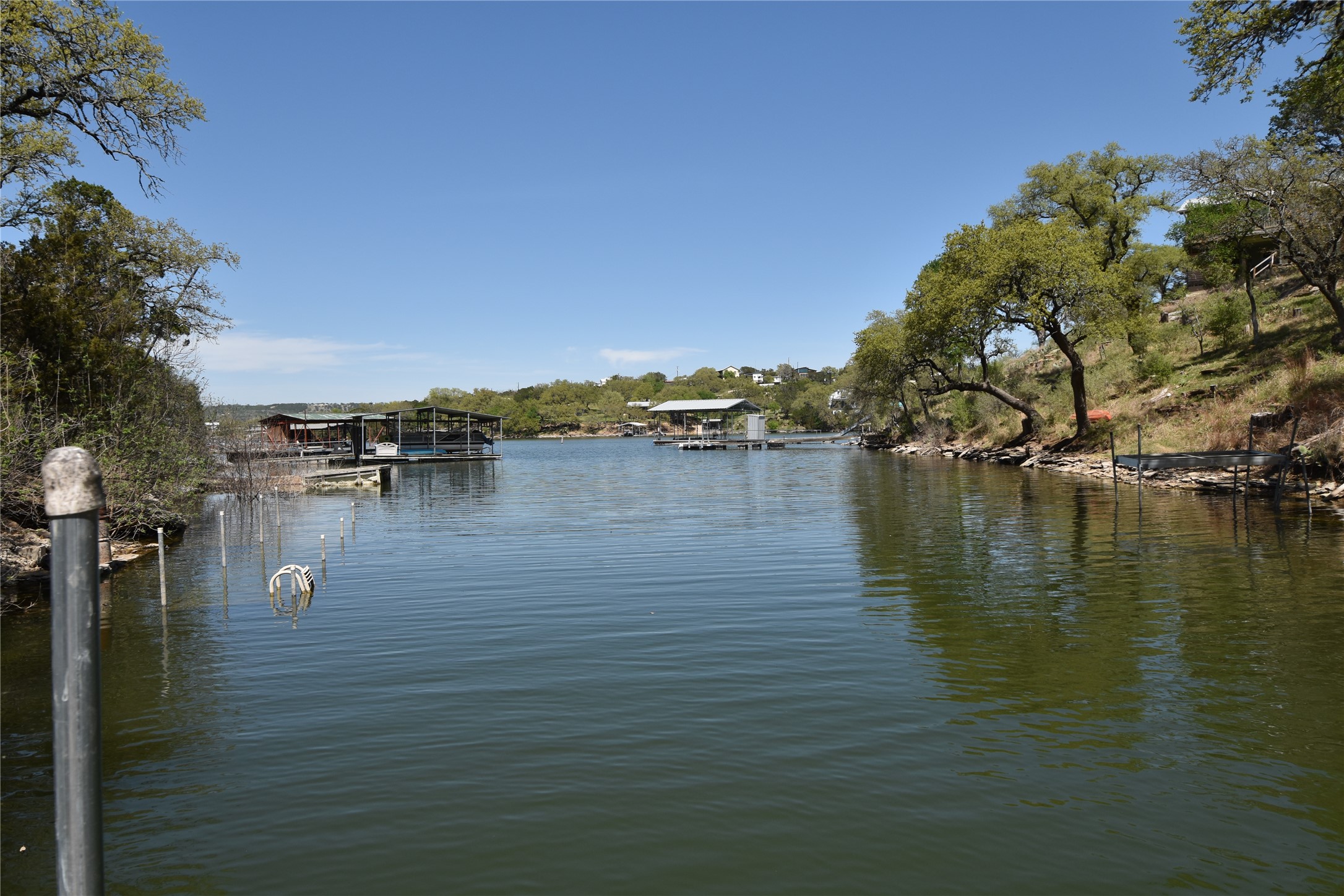 # Sunset Cliff Road Burnet, TX 78611 - Photo 2 of 12 Water view with a boat dock into the main water