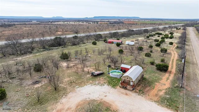 an aerial view of beach and ocean