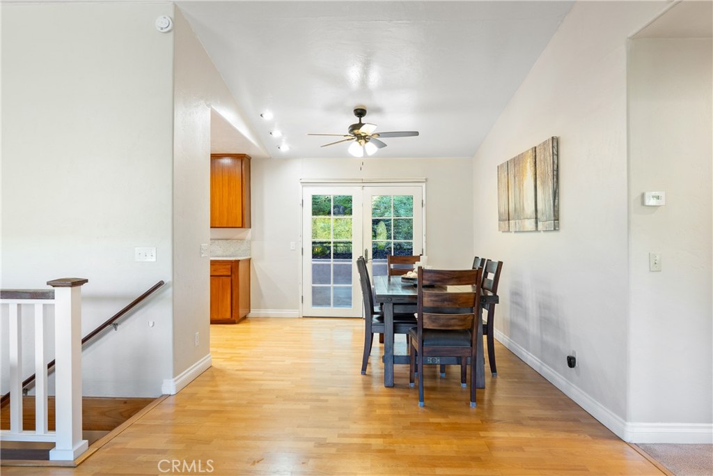 8505 Santa Cruz Road Atascadero, CA 93422 - Photo 13 of 59 a view of a dining room with furniture and chandelier