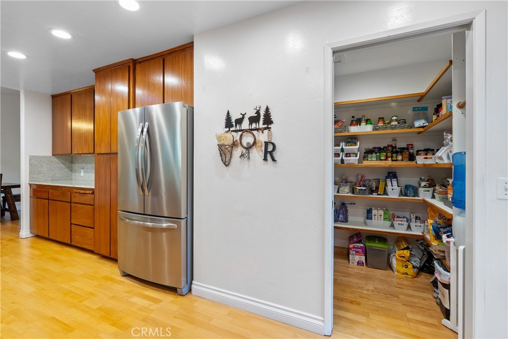 8505 Santa Cruz Road Atascadero, CA 93422 - Photo 19 of 59 a kitchen with stainless steel appliances granite countertop a refrigerator and a sink