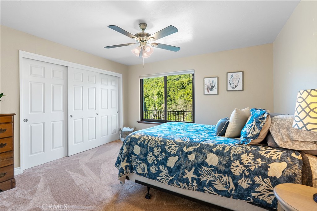 8505 Santa Cruz Road Atascadero, CA 93422 - Photo 21 of 59 a bedroom with a bed and window