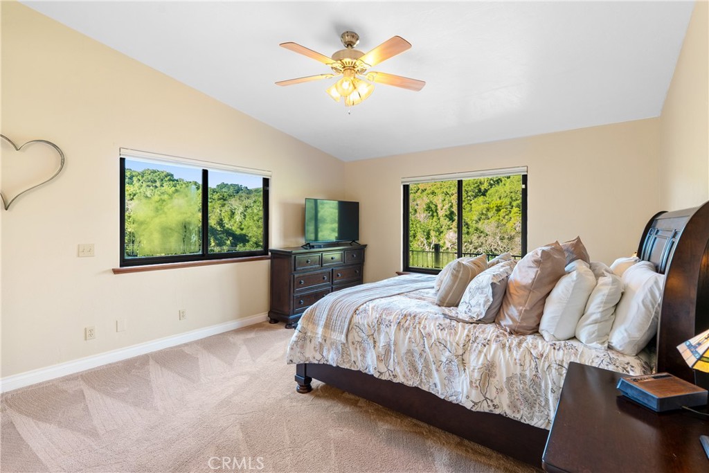 8505 Santa Cruz Road Atascadero, CA 93422 - Photo 25 of 59 a bedroom with a bed and a window