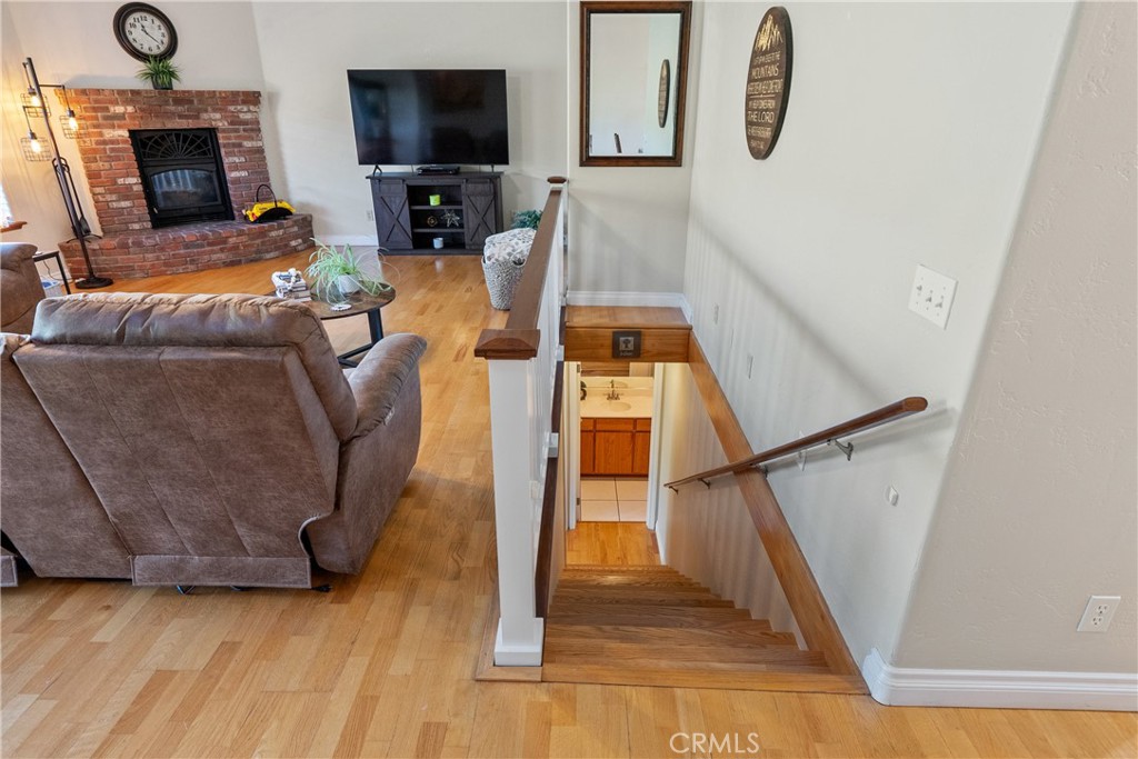 8505 Santa Cruz Road Atascadero, CA 93422 - Photo 31 of 59 a living room with furniture and a flat screen tv