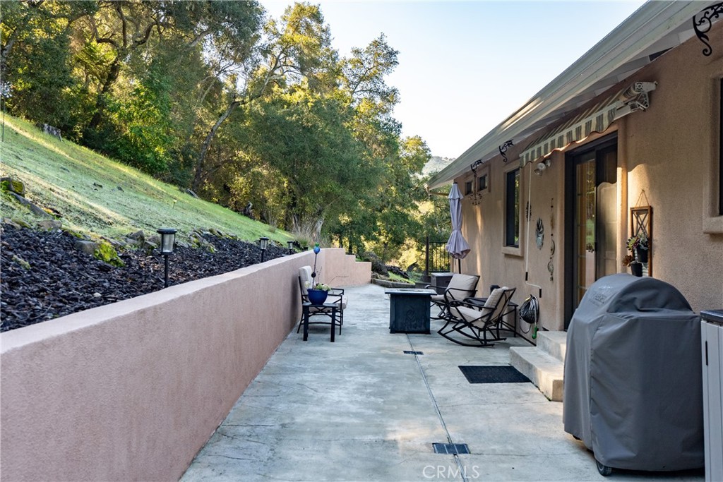8505 Santa Cruz Road Atascadero, CA 93422 - Photo 48 of 59 Spacious back patio offers ample room for entertaining or simply relaxing and taking in the surroundings.