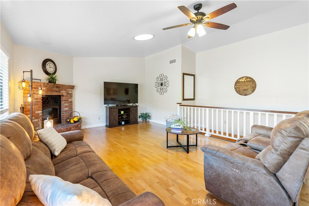 8505 Santa Cruz Road Atascadero, CA 93422 - Photo 9 of 59 a living room with furniture and a fireplace