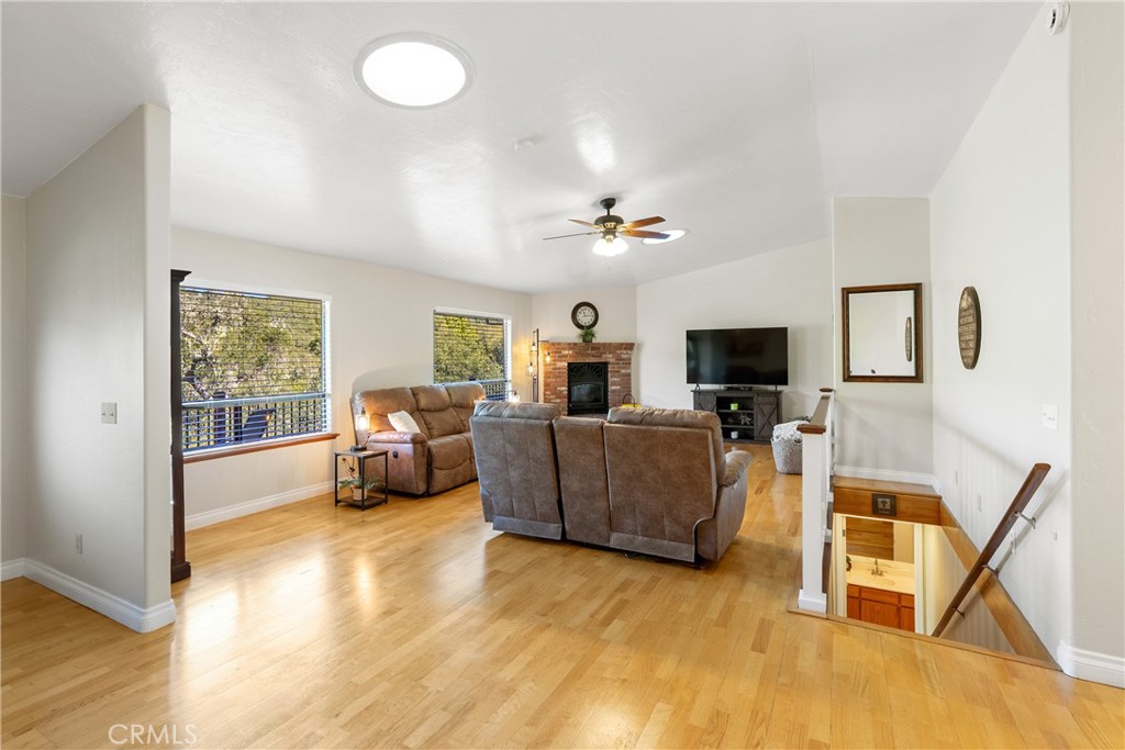 8505 Santa Cruz Road Atascadero, CA 93422 - Photo 10 of 59 a living room with furniture and a flat screen tv