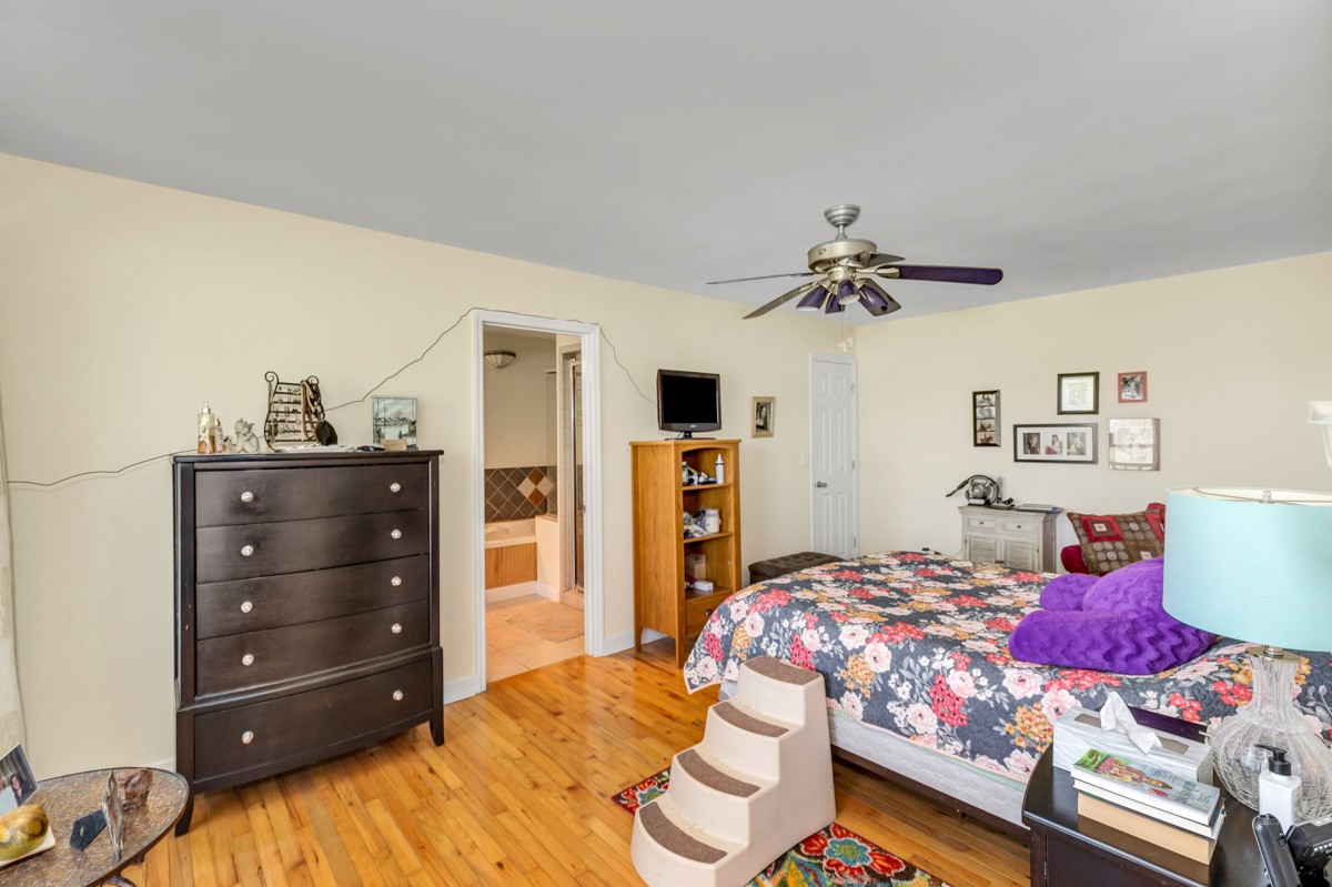 28140 Mitchell Road Ardmore, AL 35739 - Photo 12 of 24 a bedroom with a bed and a dresser