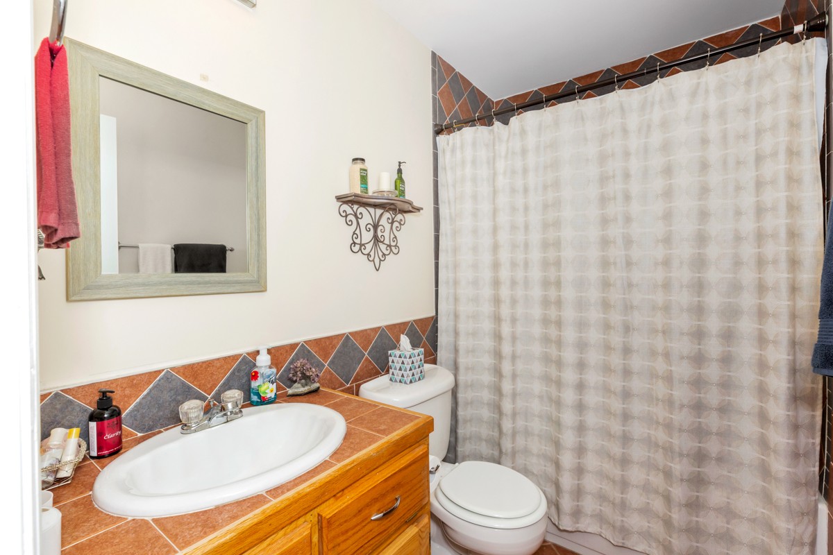 28140 Mitchell Road Ardmore, AL 35739 - Photo 16 of 24 a bathroom with a sink and a mirror