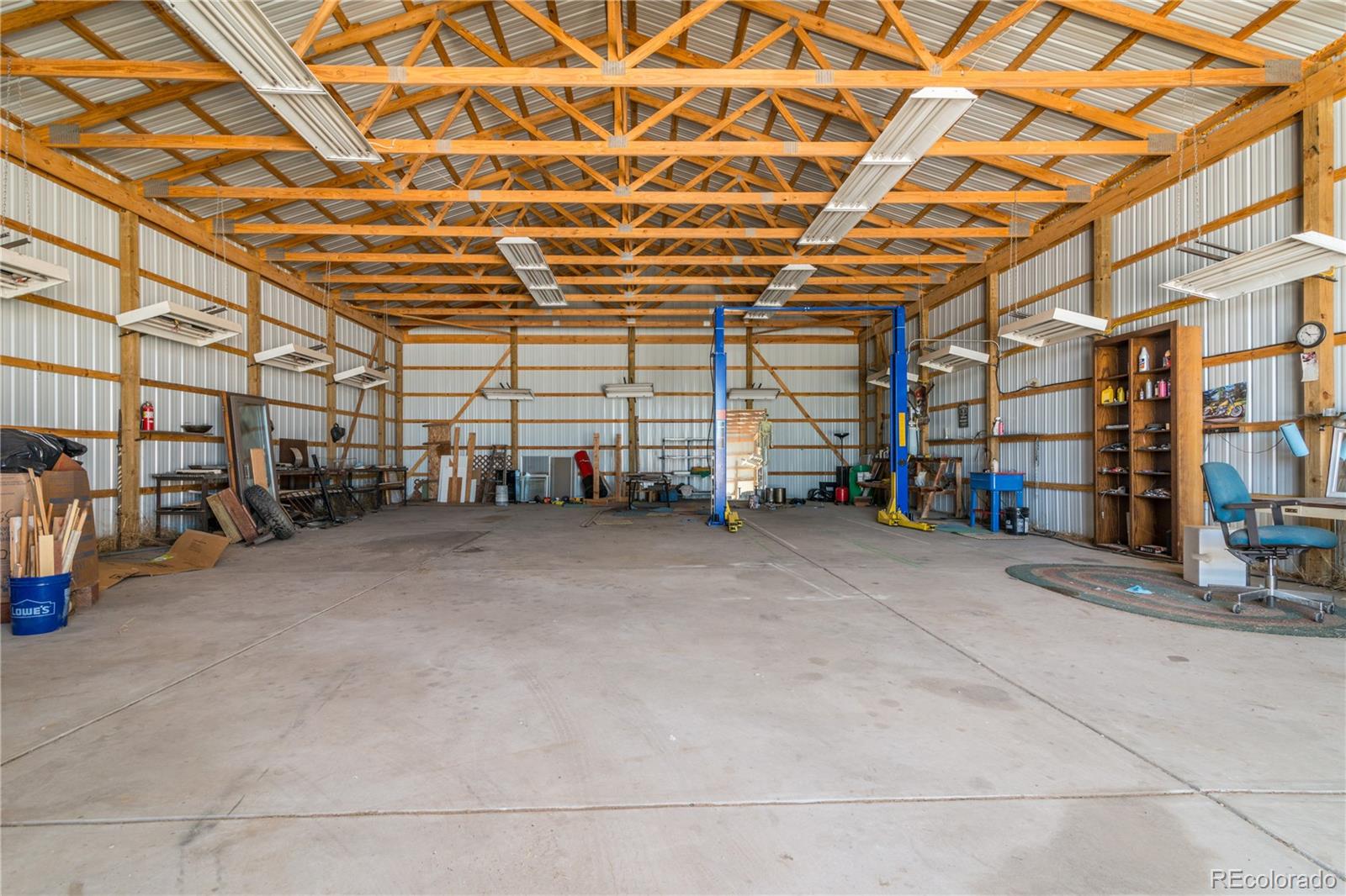 16065 Jones Road Peyton, CO 80831 - Photo 25 of 29 a view of a room with wooden walls