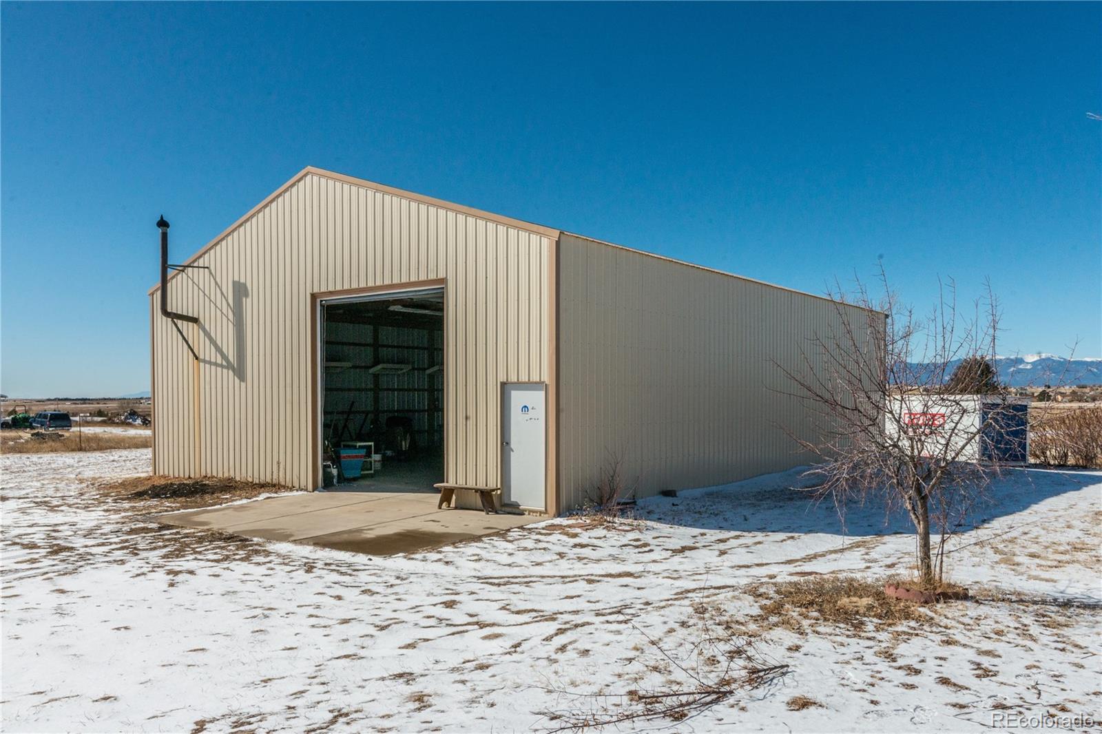 16065 Jones Road Peyton, CO 80831 - Photo 26 of 29 a view of a garage