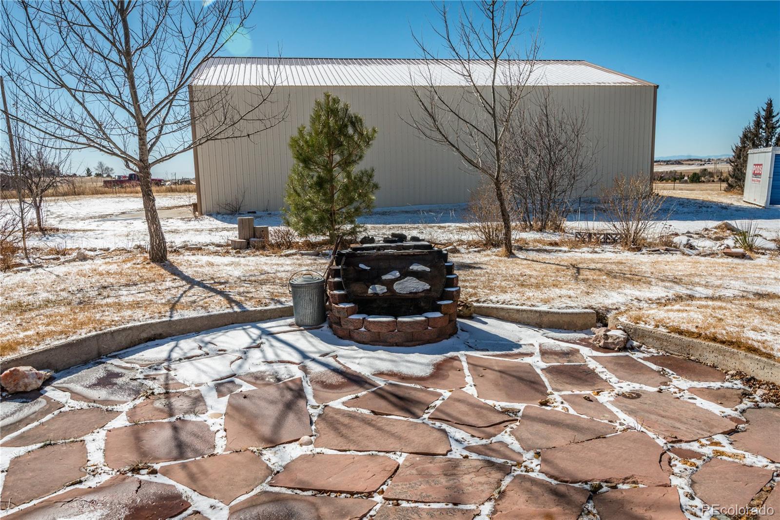 16065 Jones Road Peyton, CO 80831 - Photo 27 of 29 a view of a backyard of snow