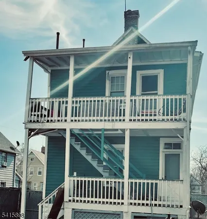 a front view of a house with balcony