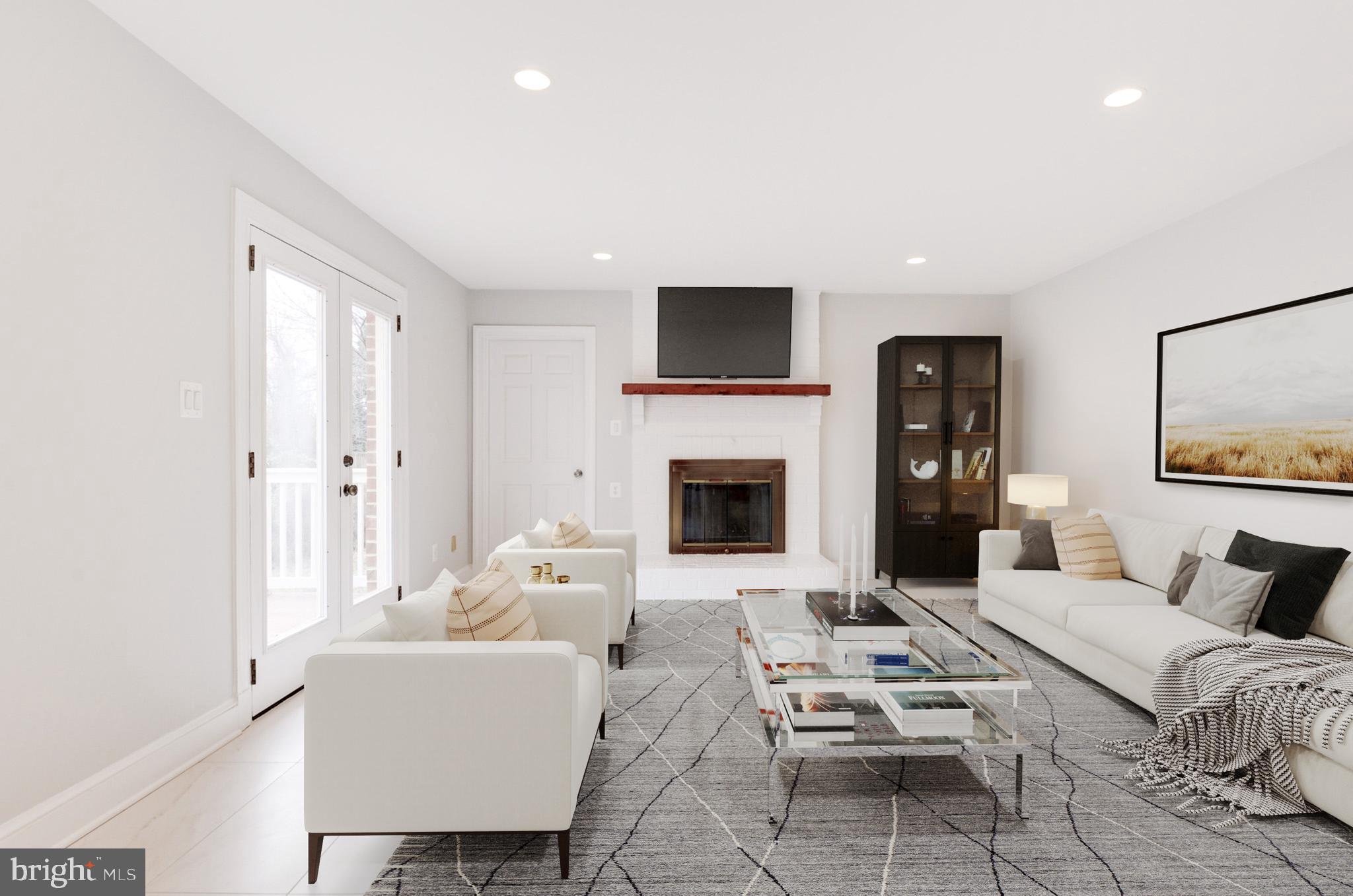 2045 Hunter Mill Road Vienna, VA 22181 - Photo 14 of 35 Family Room w/ door to deck - virtually staged