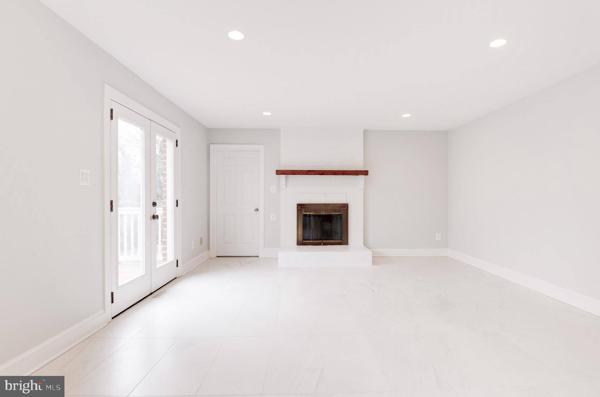2045 Hunter Mill Road Vienna, VA 22181 - Photo 15 of 35 Family Room leads to the deck