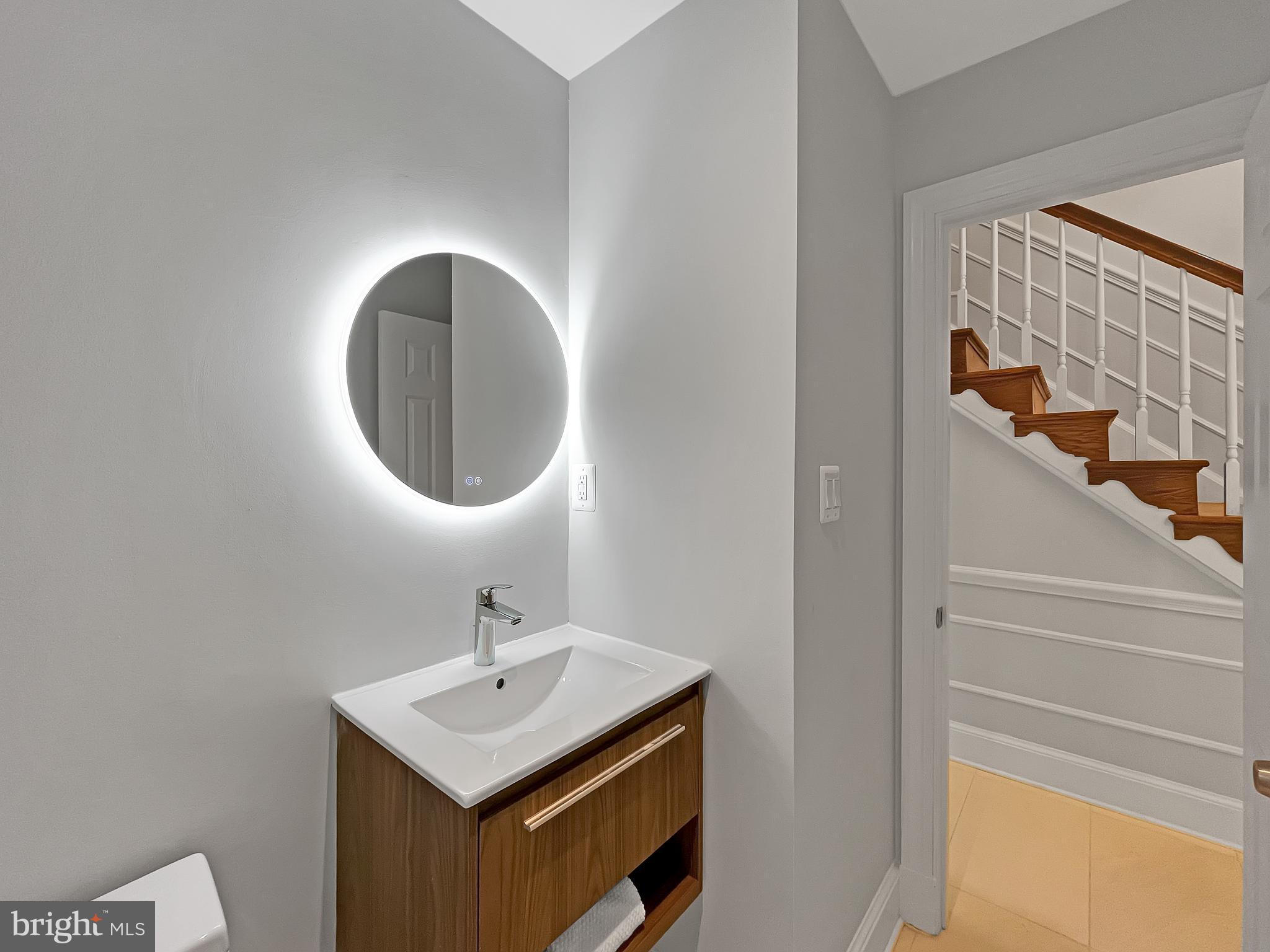 2045 Hunter Mill Road Vienna, VA 22181 - Photo 18 of 35 Conveniently located powder room off foyer