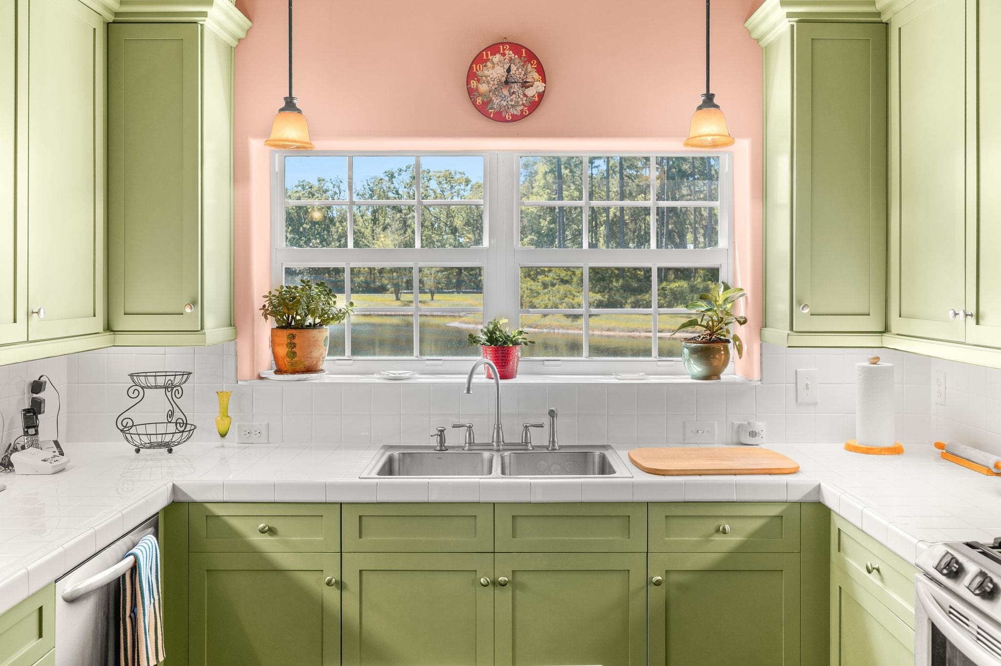 99 Grand Ravine Drive St. Augustine, FL 32086 - Photo 18 of 42 a bathroom with a sink and a window