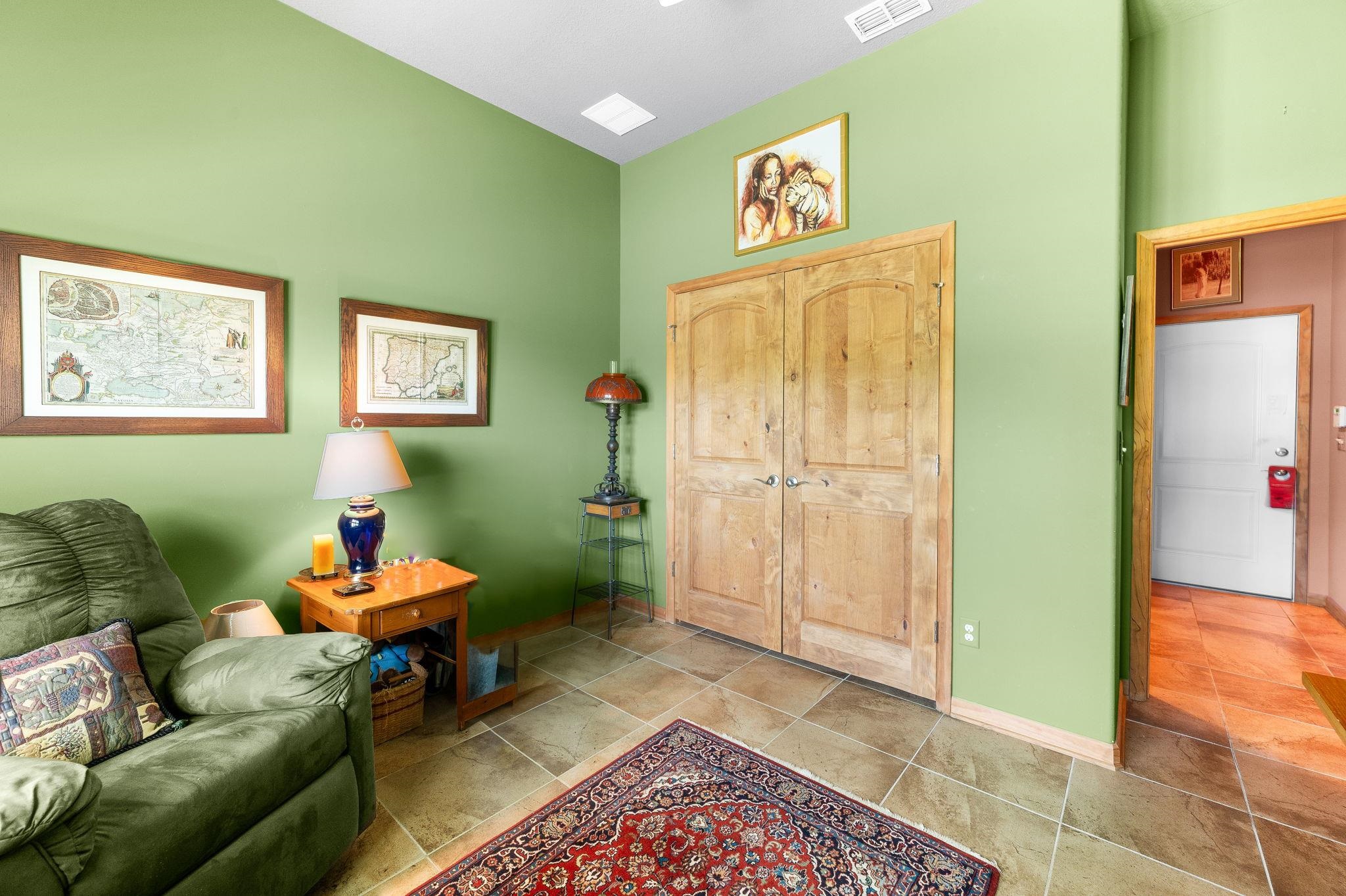99 Grand Ravine Drive St. Augustine, FL 32086 - Photo 25 of 42 a living room with furniture and a window