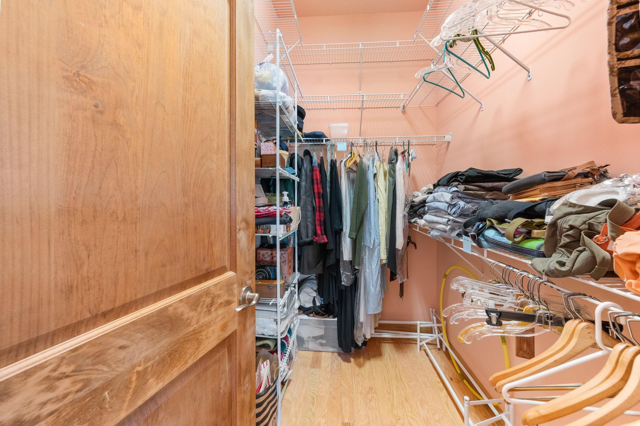 99 Grand Ravine Drive St. Augustine, FL 32086 - Photo 31 of 42 a view of walk in closet with clothes