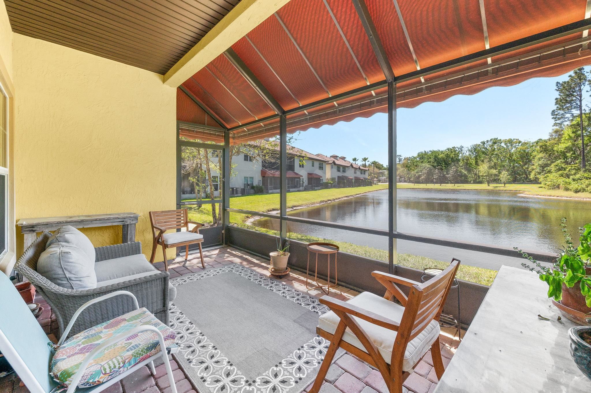 99 Grand Ravine Drive St. Augustine, FL 32086 - Photo 39 of 42 a view of a chairs and table in the patio