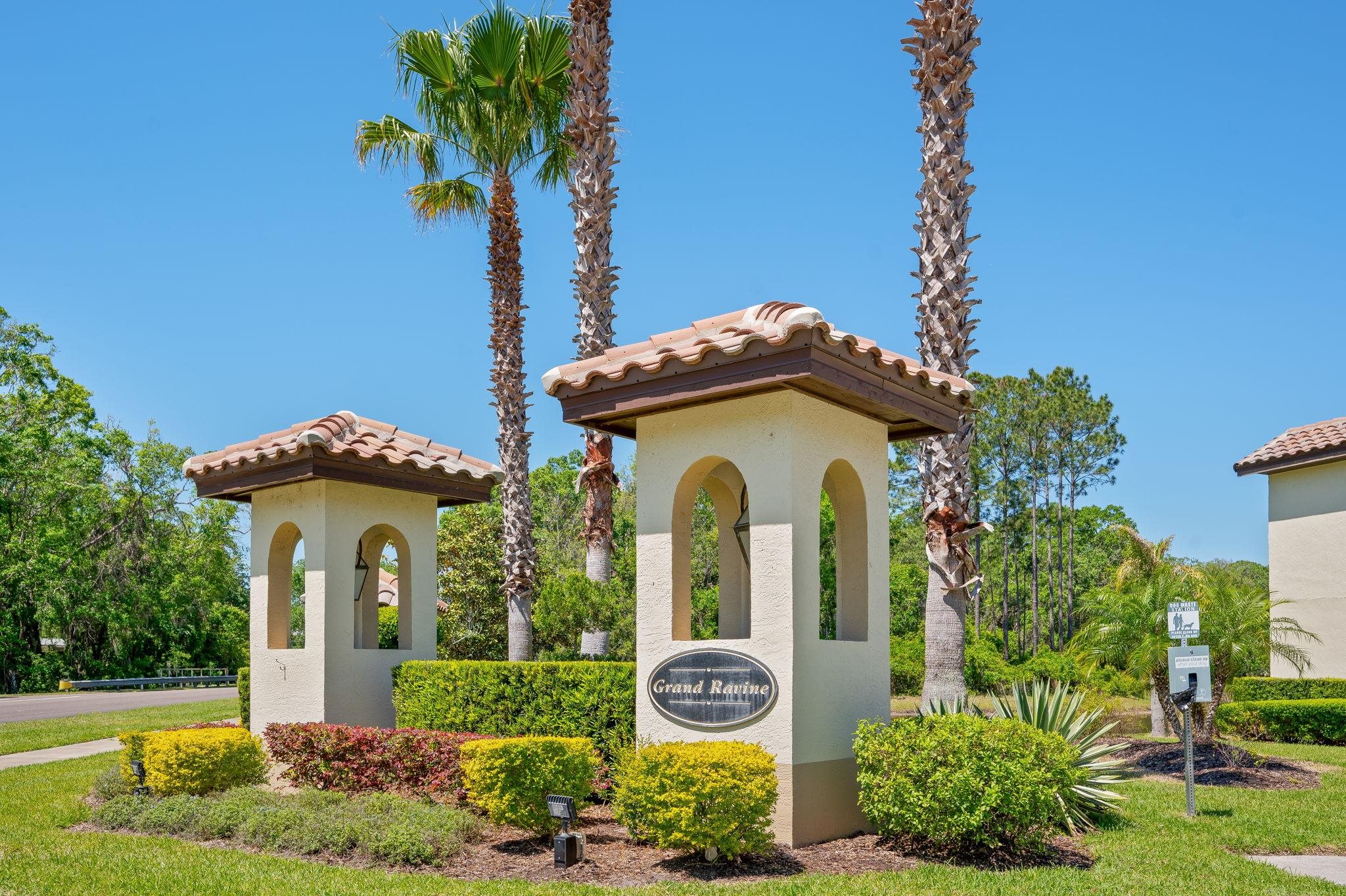 99 Grand Ravine Drive St. Augustine, FL 32086 - Photo 5 of 42 a front view of a house with garden