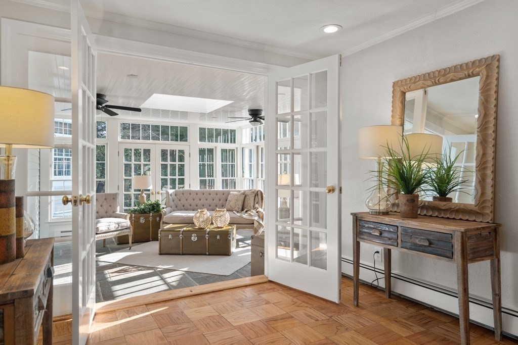 105 Plain Road Wayland, MA 01778 - Photo 12 of 25 a living room with furniture and a potted plant