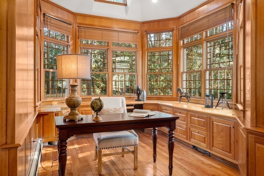 105 Plain Road Wayland, MA 01778 - Photo 14 of 25 a dining hall with stainless steel appliances kitchen island granite countertop a dining table and chairs