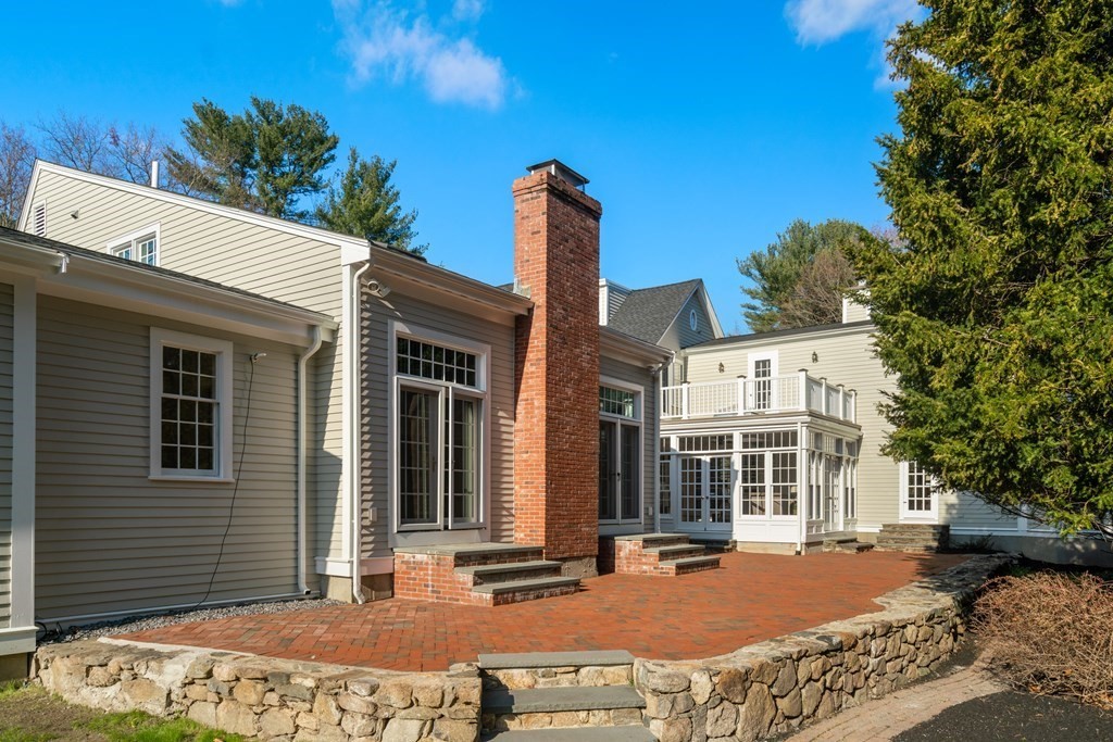 105 Plain Road Wayland, MA 01778 - Photo 25 of 25 a front view of a building with street view