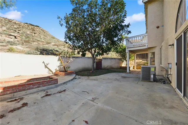 a view of a hallway with staircase