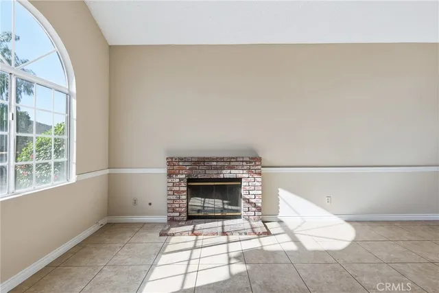 a living room with a fireplace