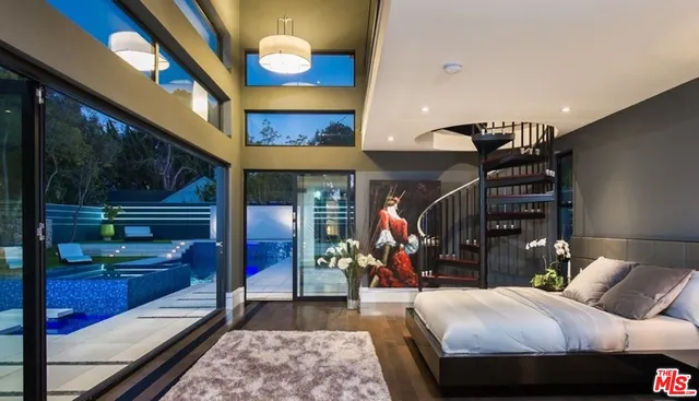 a view of living room kitchen with furniture and floor to ceiling window