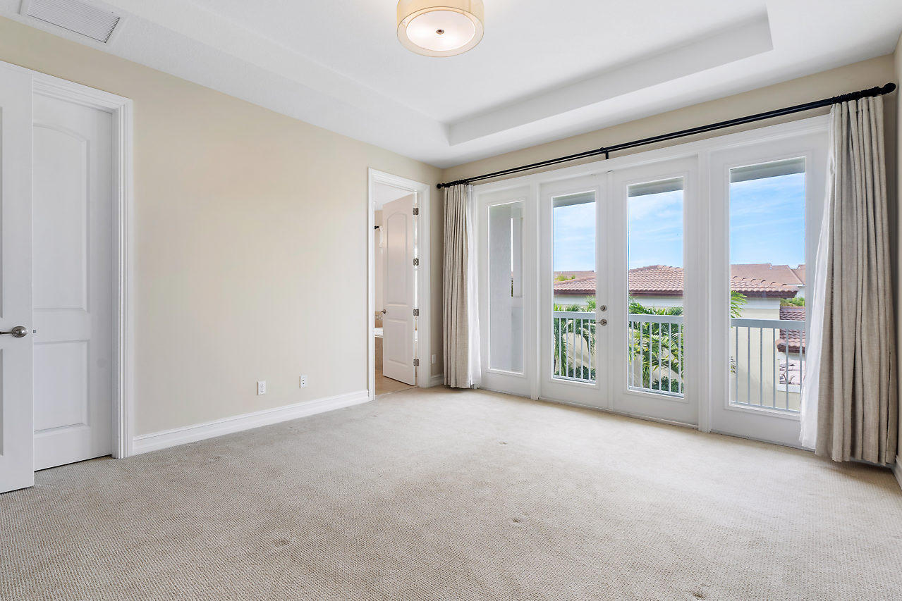 100 Northwest 69th Circle, Unit 53 Boca Raton, FL 33487 - Photo 17 of 40 Master Bedroom