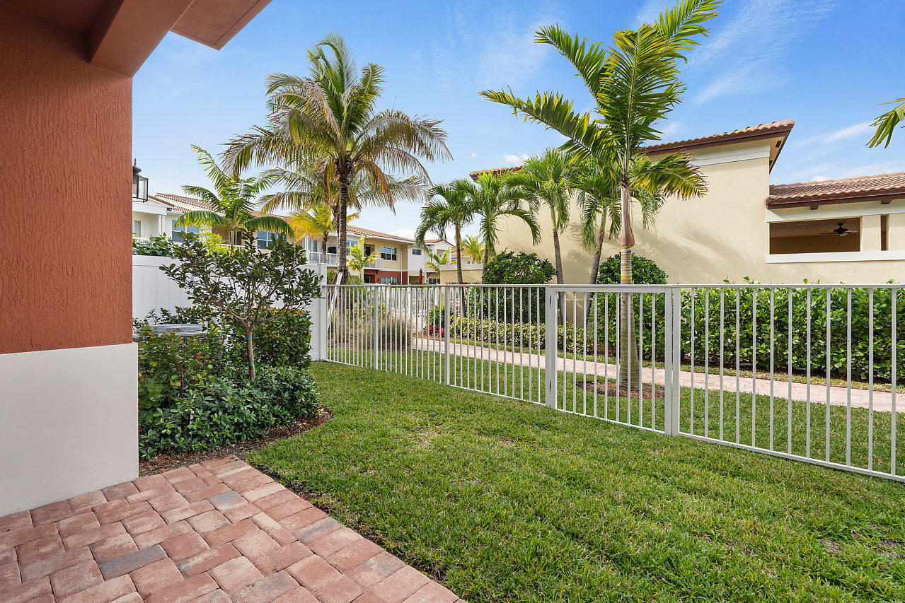 100 Northwest 69th Circle, Unit 53 Boca Raton, FL 33487 - Photo 26 of 40 Fenced Backyard