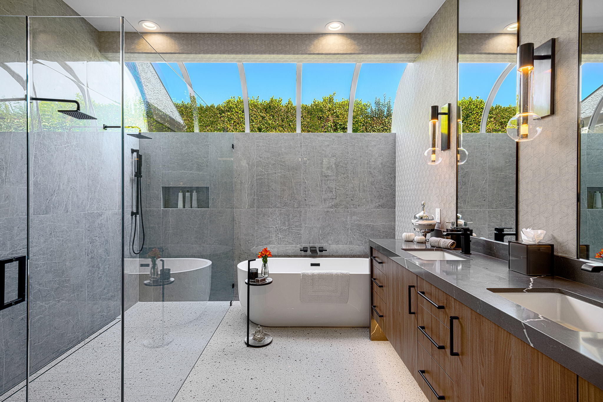 30 Mayfair Drive Rancho Mirage, CA 92270 - Photo 16 of 30 a bathroom with a double vanity sink a mirror and a bathtub