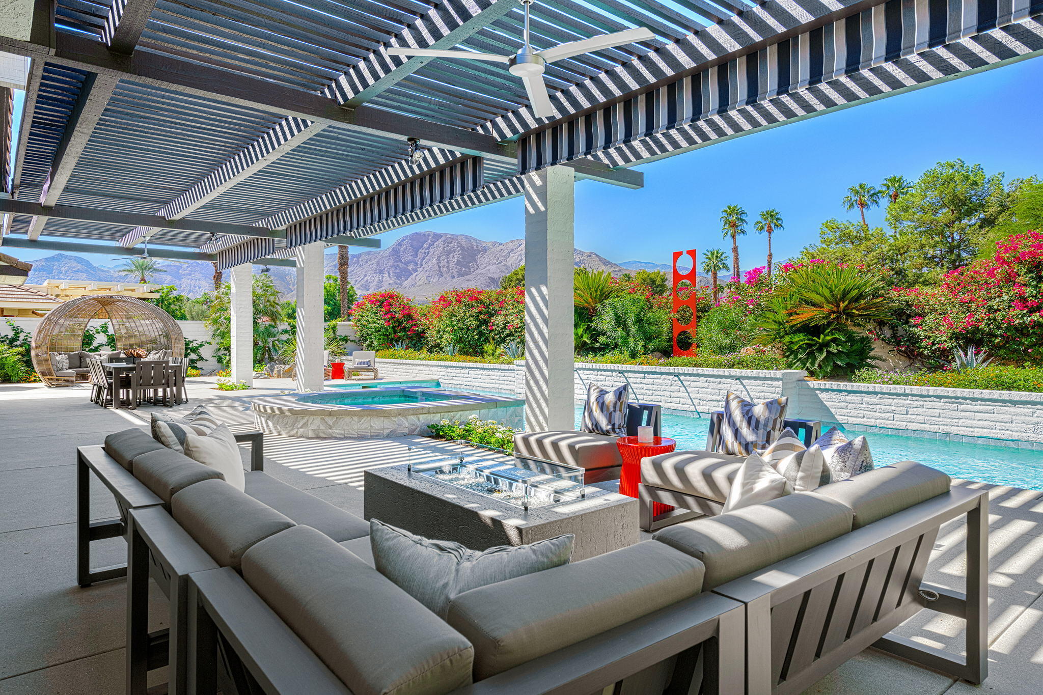 30 Mayfair Drive Rancho Mirage, CA 92270 - Photo 24 of 30 a roof deck with table and chairs and potted plants