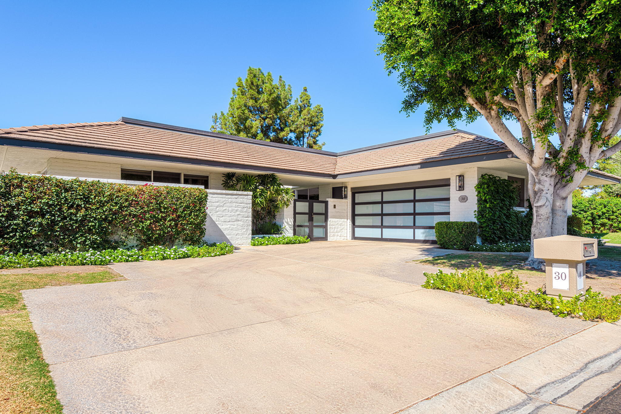 30 Mayfair Drive Rancho Mirage, CA 92270 - Photo 30 of 30 front view of a house with a yard