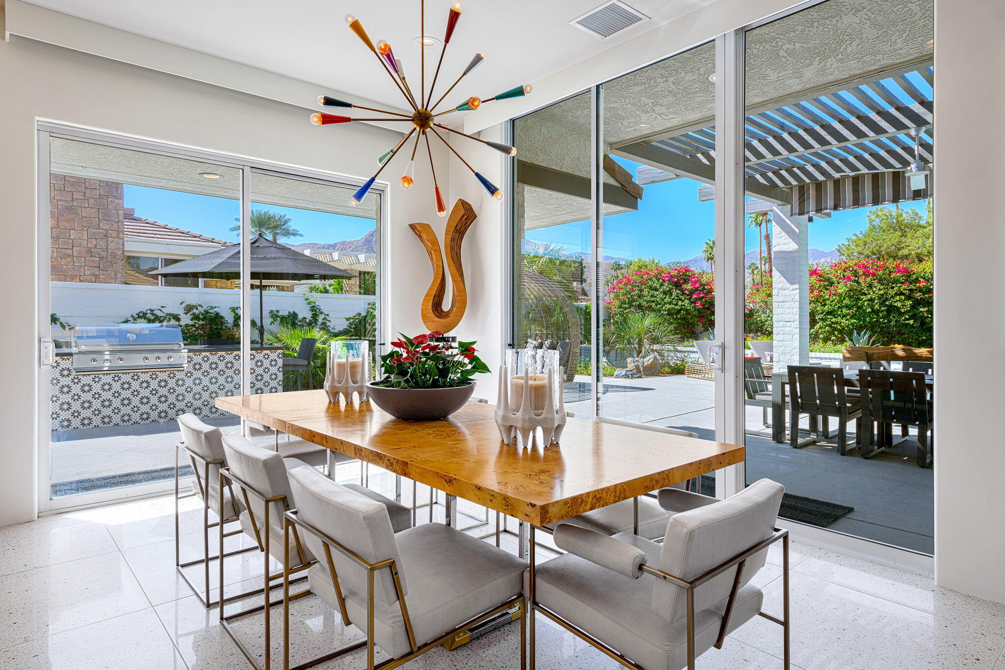 30 Mayfair Drive Rancho Mirage, CA 92270 - Photo 6 of 30 a dining area with furniture and outdoor view
