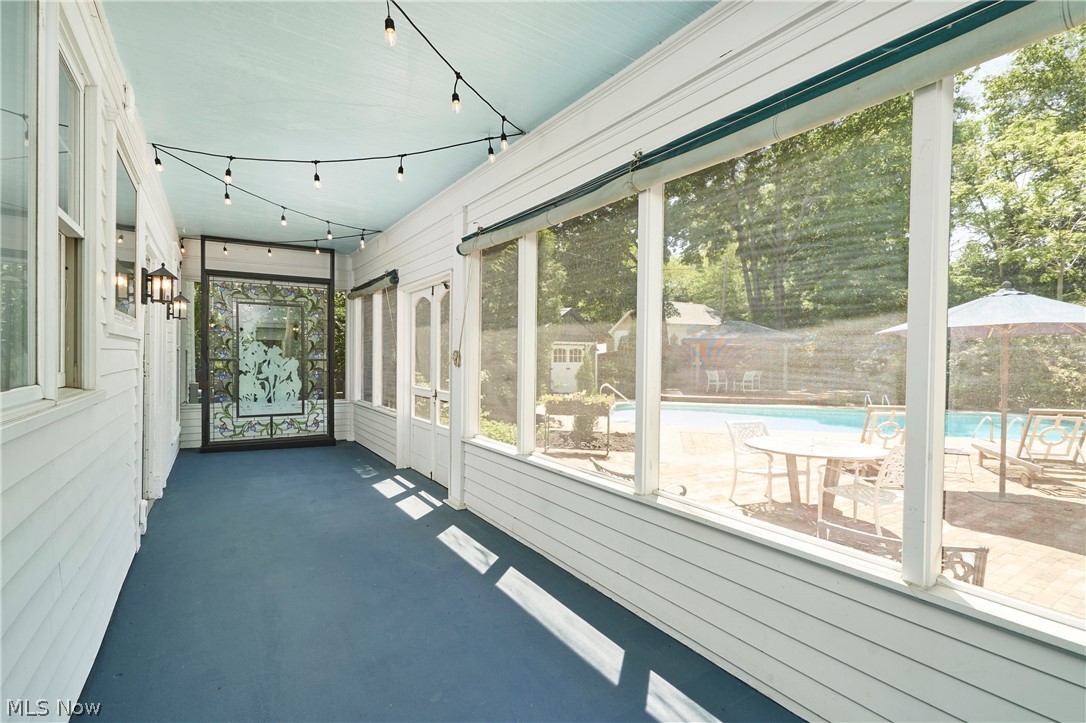 874 Merriman Road Akron, OH 44303 - Photo 30 of 50 Sunroom spans the back of the home and overlooks pool/patio area