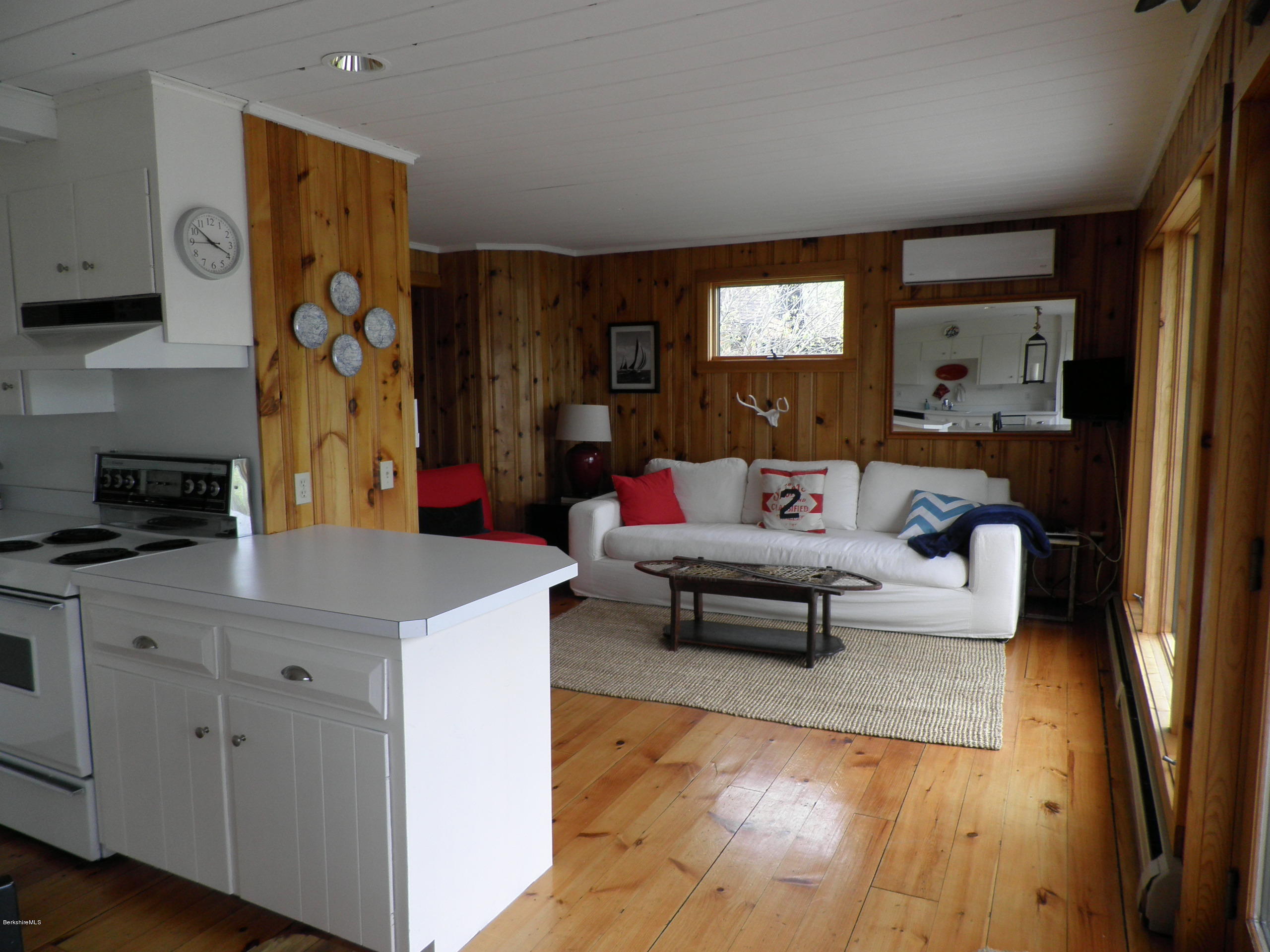 63 A Goose Pond Road Tyringham, MA 01238 - Photo 5 of 5 a living room with furniture and a window