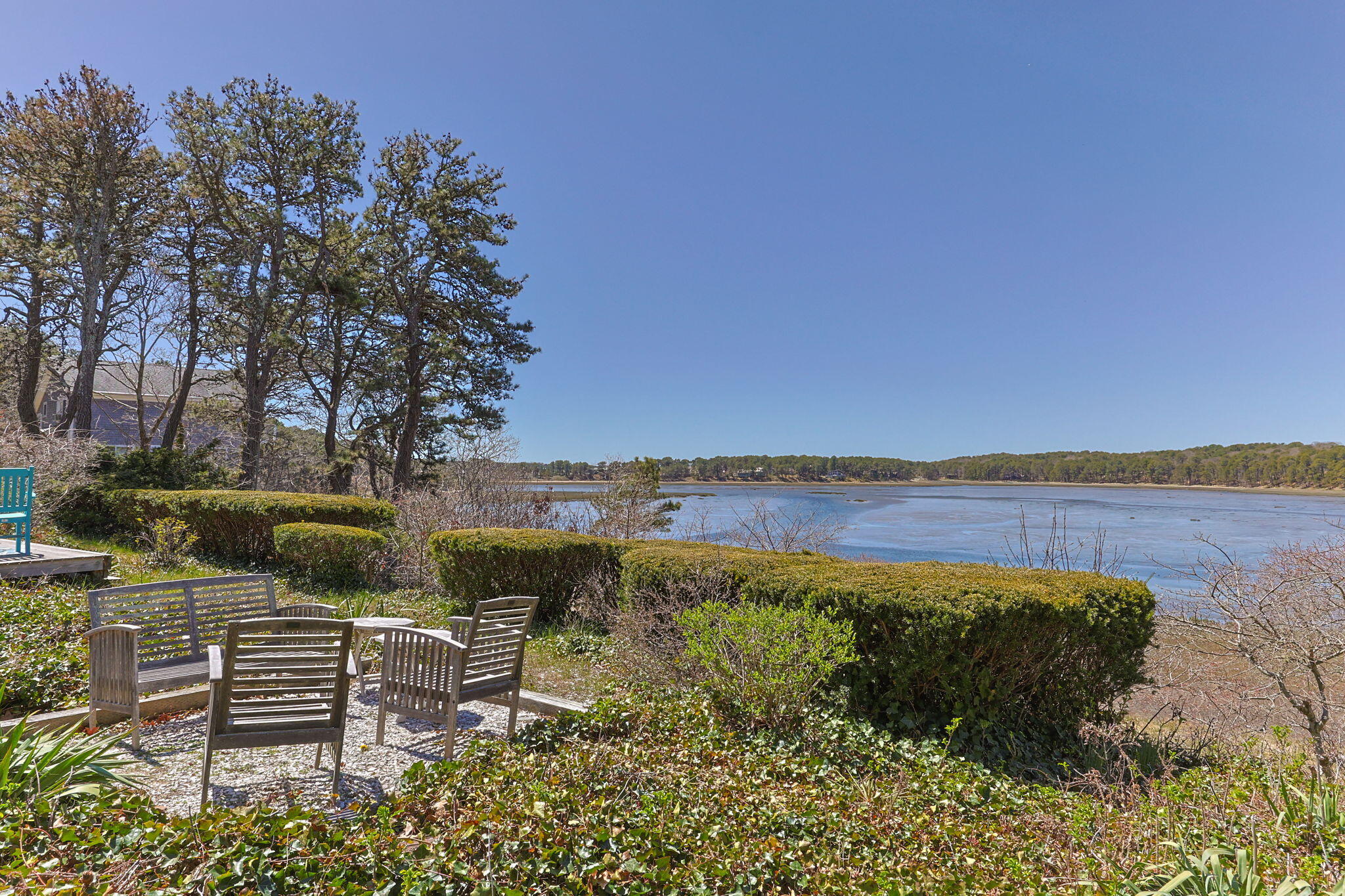 60 Long Avenue, Unit A Wellfleet, MA 02667 - Photo 25 of 28 a view of a lake with a yard