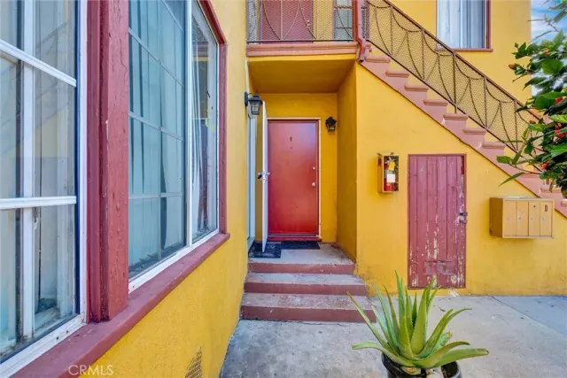 a view of a house with a small yard