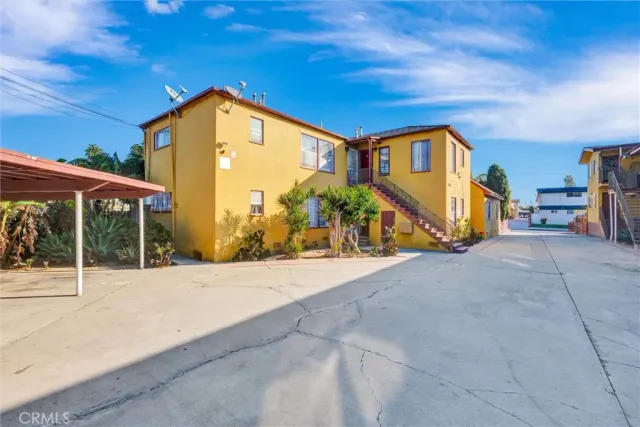 a view of house with outdoor space
