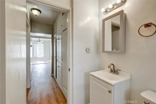 a bathroom with a sink a mirror and a shower