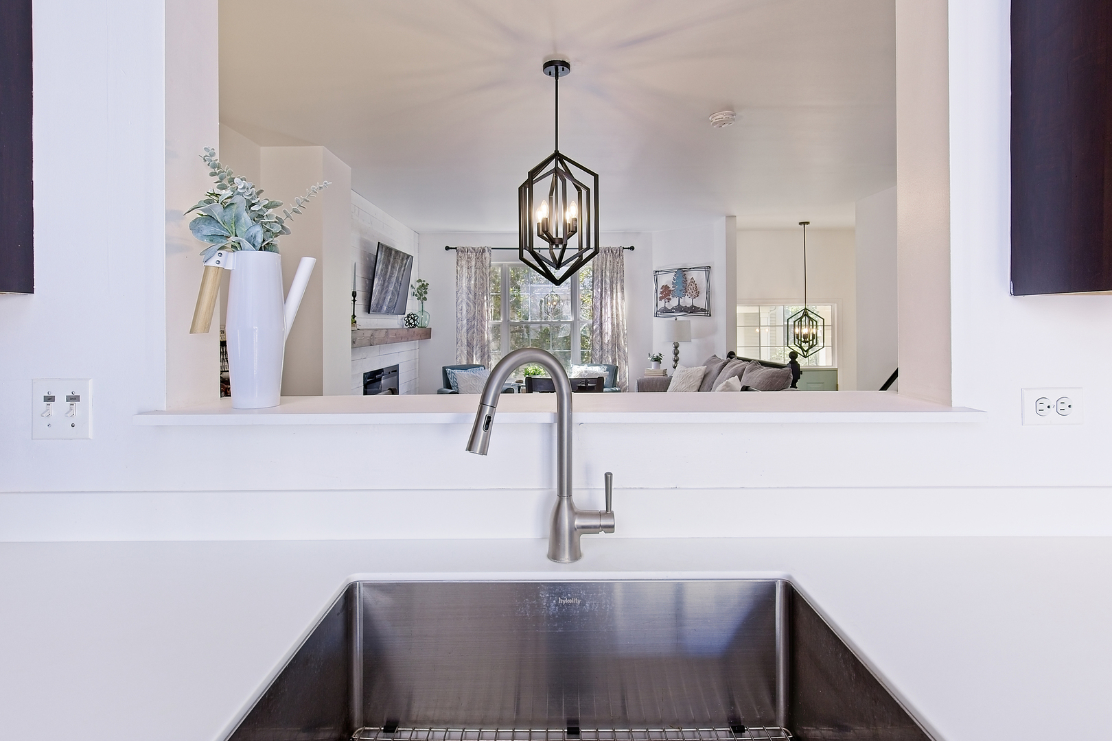 34318 North Barberry Road Round Lake Beach, IL 60073 - Photo 13 of 26 a view of a hallway with sink and mirror