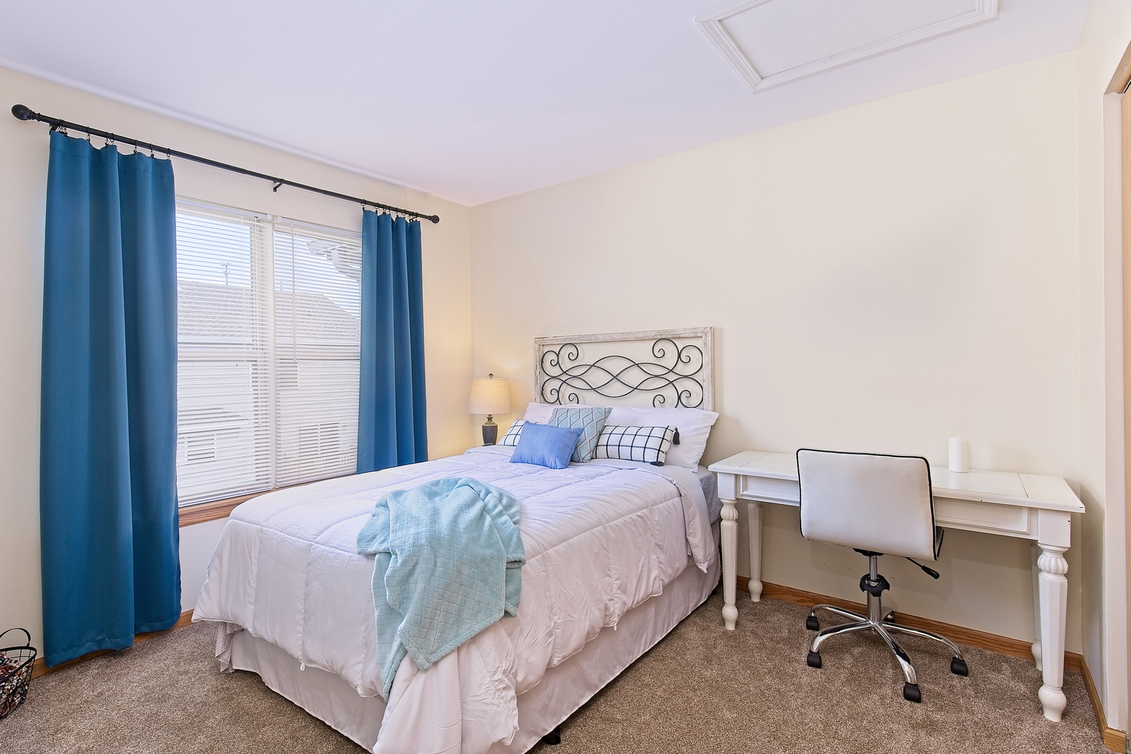 34318 North Barberry Road Round Lake Beach, IL 60073 - Photo 16 of 26 a bedroom with a bed and a window