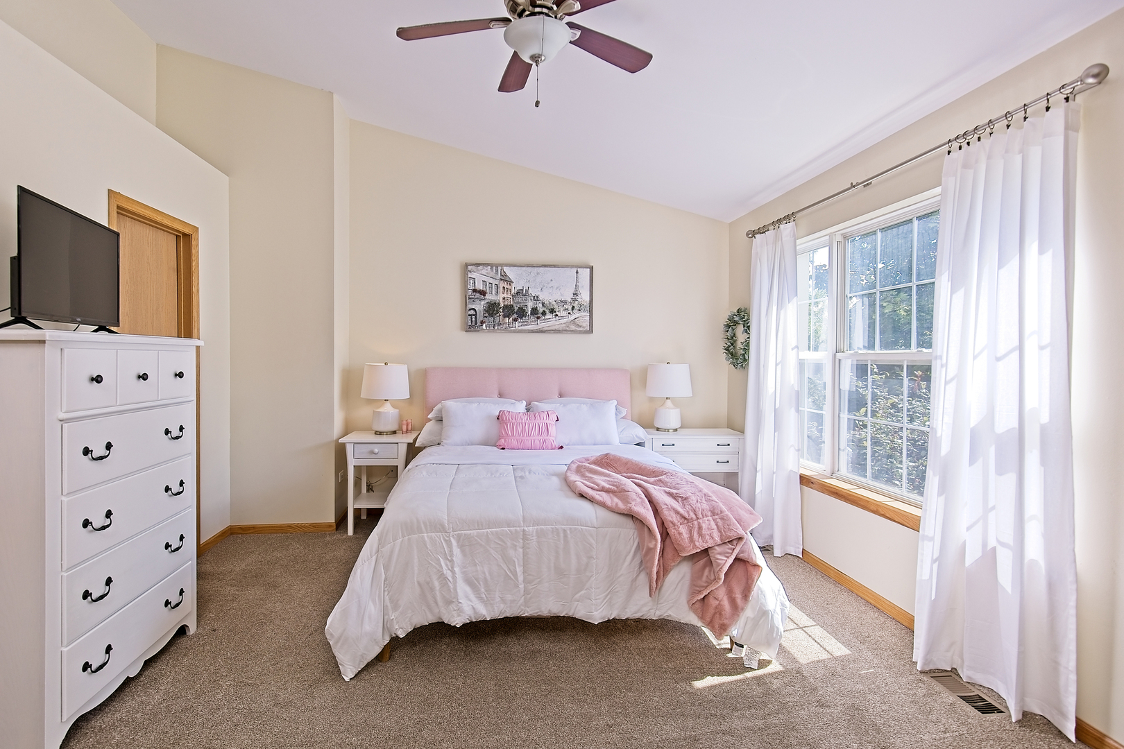 34318 North Barberry Road Round Lake Beach, IL 60073 - Photo 18 of 26 a bedroom with a bed and a flat tv screen on the dresser