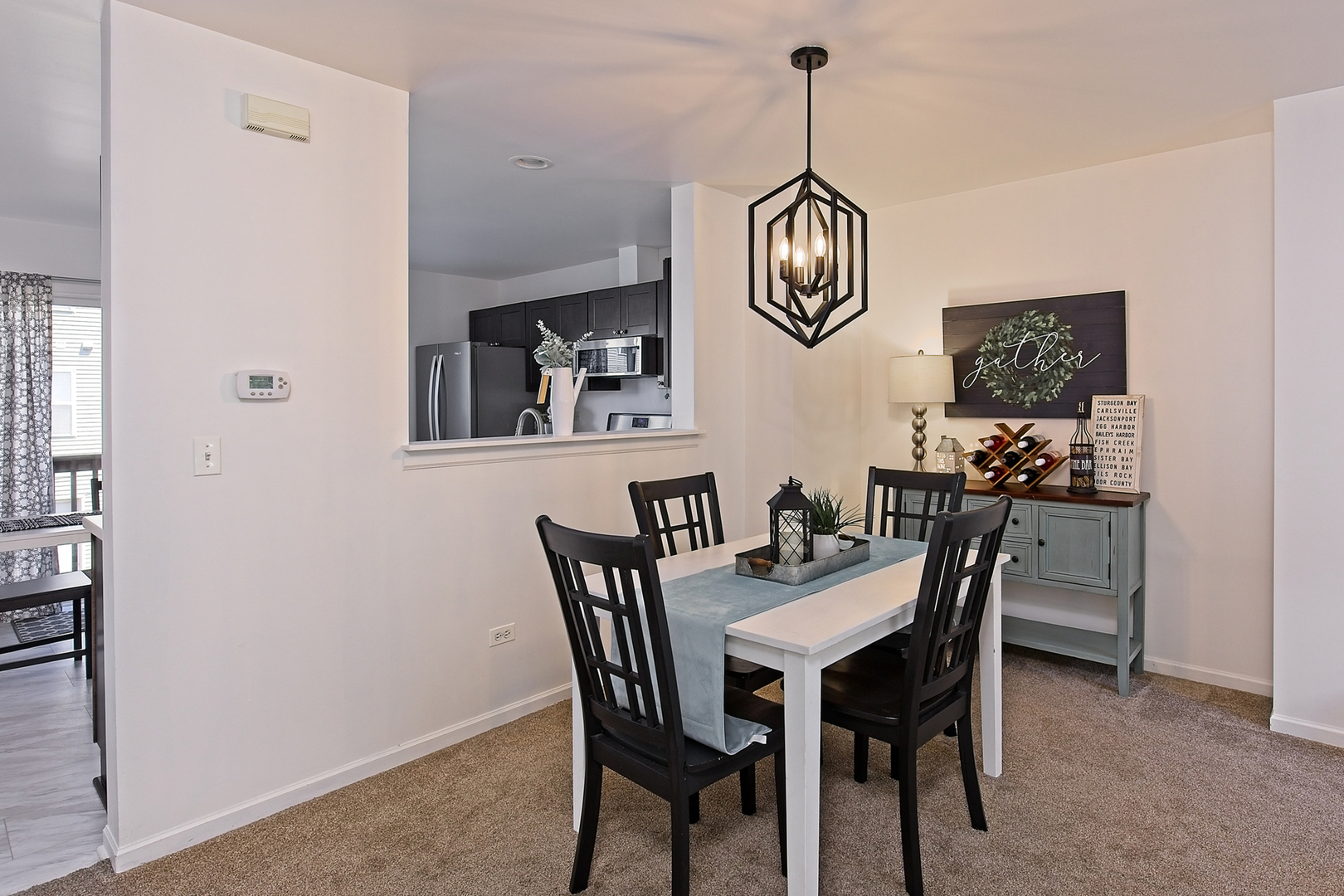 34318 North Barberry Road Round Lake Beach, IL 60073 - Photo 9 of 26 a view of a dining room with furniture