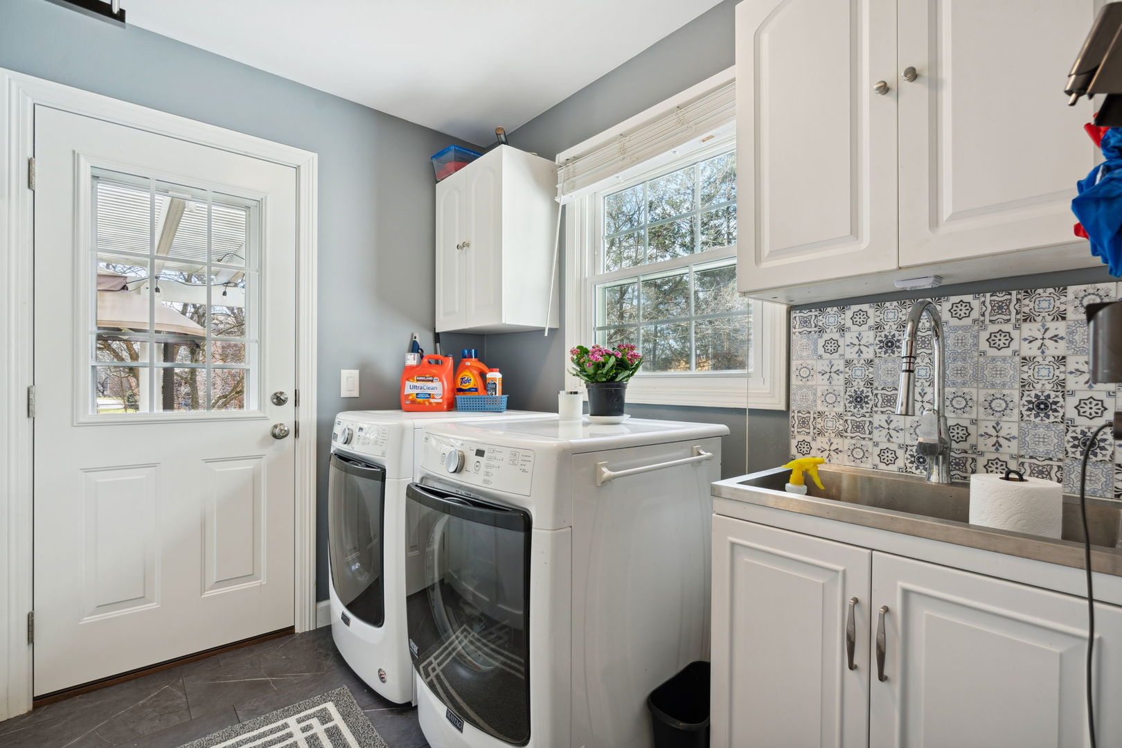 1246 Edward Road Naperville, IL 60540 - Photo 11 of 21 a kitchen with a sink and cabinets