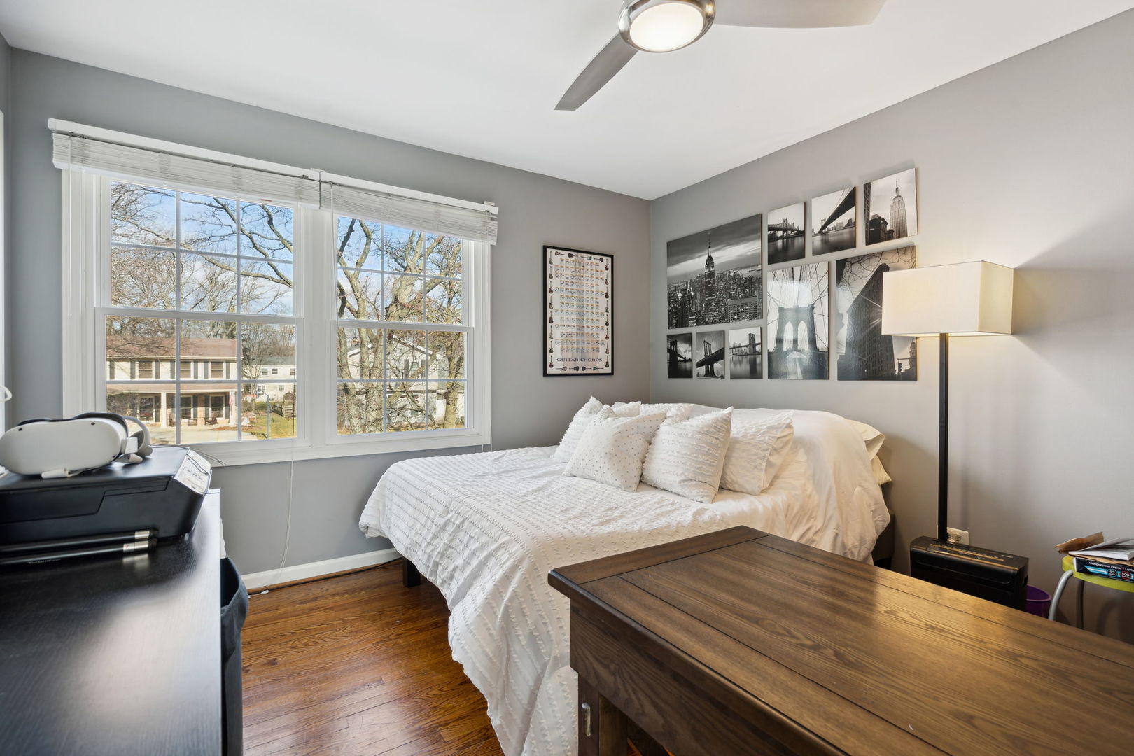 1246 Edward Road Naperville, IL 60540 - Photo 16 of 21 a bedroom with a bed and a large window