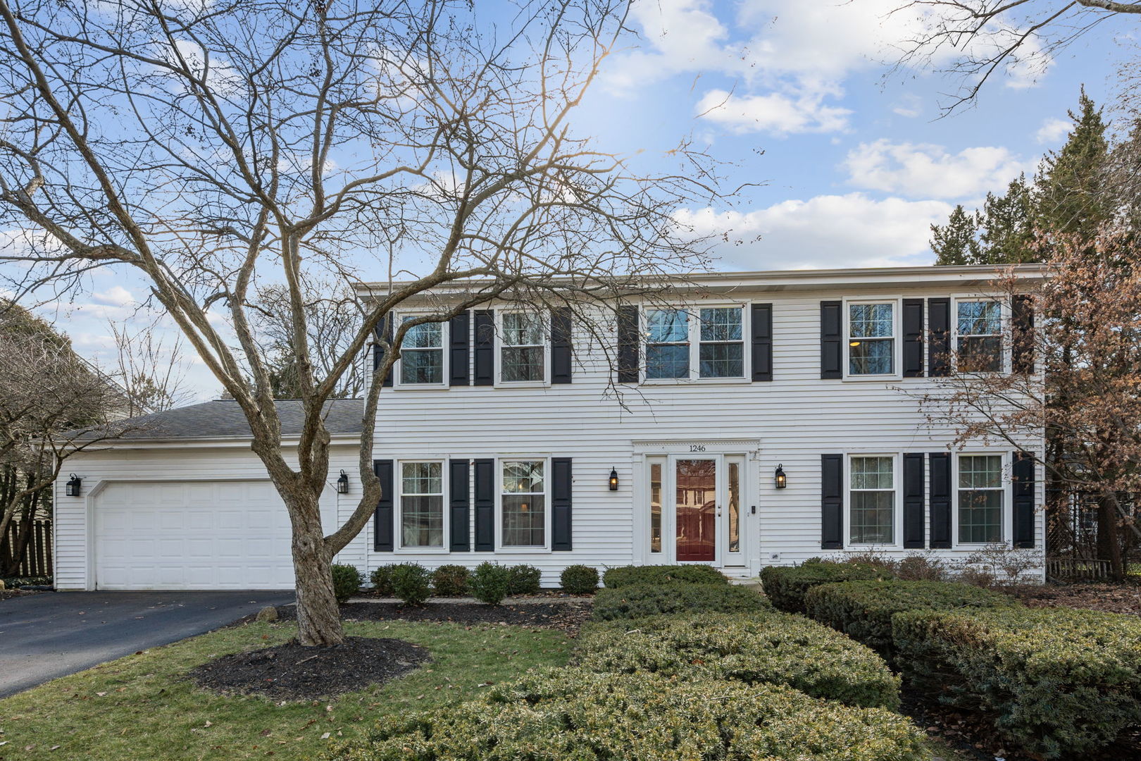 1246 Edward Road Naperville, IL 60540 - Photo 2 of 21 a large brick building with large windows
